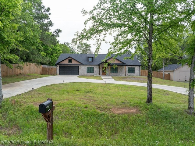 8208 Shaver Rd, Lavaca, AR 72941 - view of front of house with a front lawn, driveway, a garage, and fence