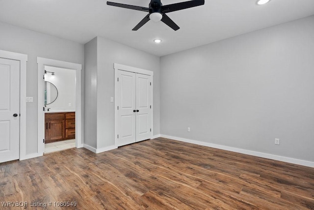 8208 Shaver Rd, Lavaca, AR 72941 - unfurnished bedroom with recessed lighting, wood finished floors, and baseboards