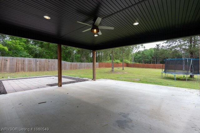 8208 Shaver Rd, Lavaca, AR 72941 - view of patio / terrace with a fenced backyard, a ceiling fan, and a trampoline