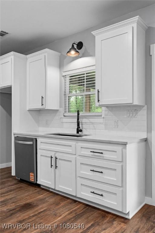 8208 Shaver Rd, Lavaca, AR 72941 - kitchen with backsplash, dishwasher, a sink, white cabinetry, and visible vents