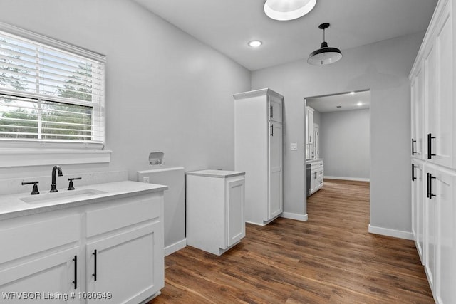 8208 Shaver Rd, Lavaca, AR 72941 - bathroom with wood finished floors, vanity, recessed lighting, and baseboards