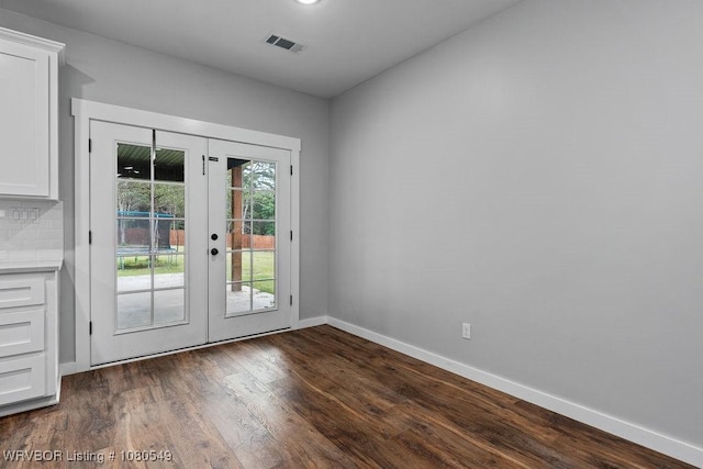 8208 Shaver Rd, Lavaca, AR 72941 - entryway with visible vents, baseboards, french doors, and dark wood-type flooring