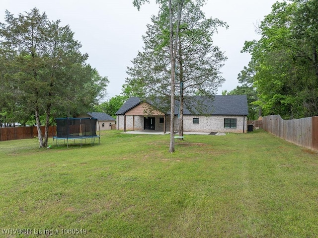 8208 Shaver Rd, Lavaca, AR 72941 - view of yard with a fenced backyard, a patio area, and a trampoline