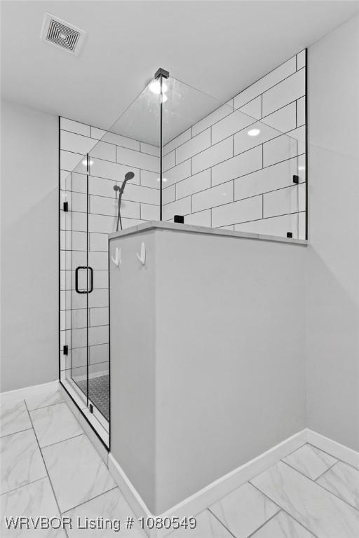 8208 Shaver Rd, Lavaca, AR 72941 - bathroom with a stall shower, visible vents, marble finish floor, and baseboards