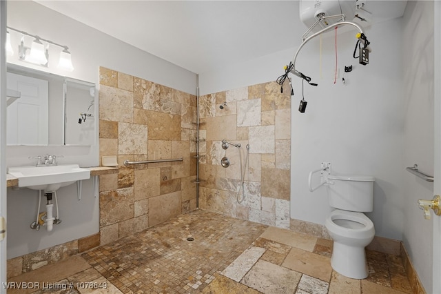 bathroom with tiled shower and toilet