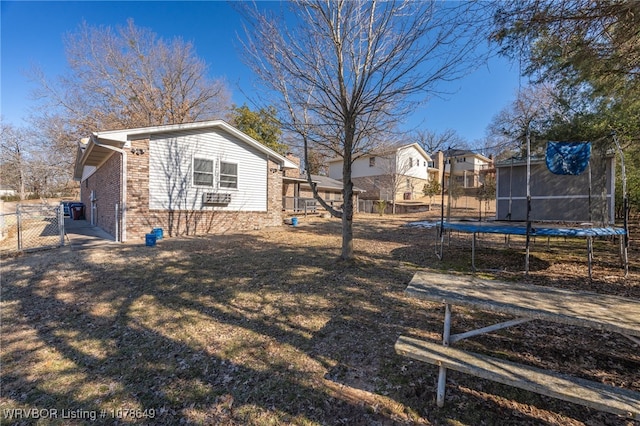 view of yard featuring a trampoline