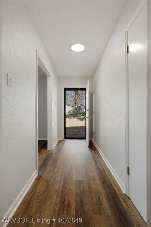 hall featuring dark hardwood / wood-style floors