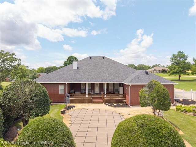 11805 Springridge Dr, Fort Smith, AR 72916 - rear view of property featuring covered porch, brick siding, and a shingled roof