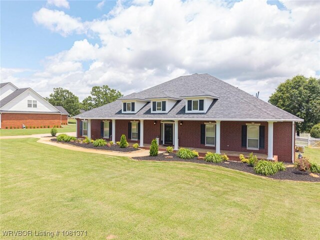 11805 Springridge Dr, Fort Smith, AR 72916 - view of front of home with a front lawn, a shingled roof, and brick siding