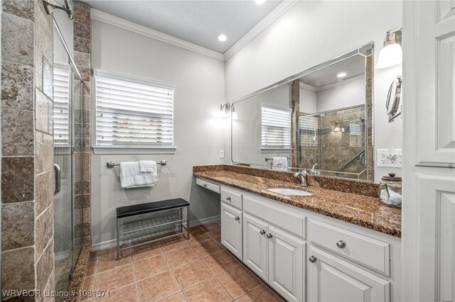11805 Springridge Dr, Fort Smith, AR 72916 - bathroom featuring crown molding, vanity, a stall shower, tile patterned flooring, and recessed lighting