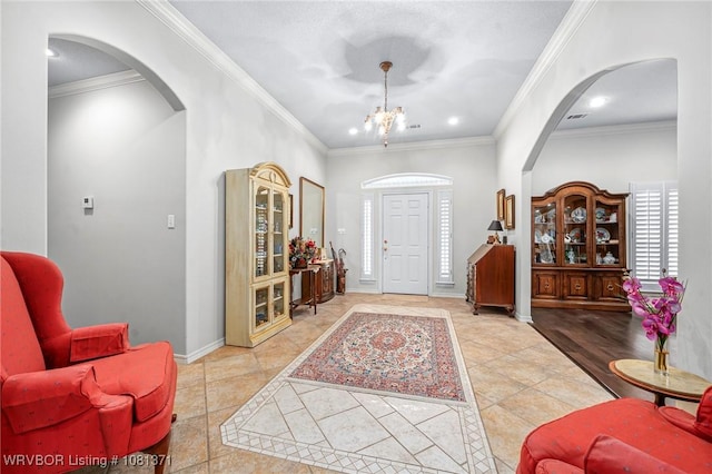 11805 Springridge Dr, Fort Smith, AR 72916 - foyer featuring arched walkways, crown molding, recessed lighting, and a chandelier