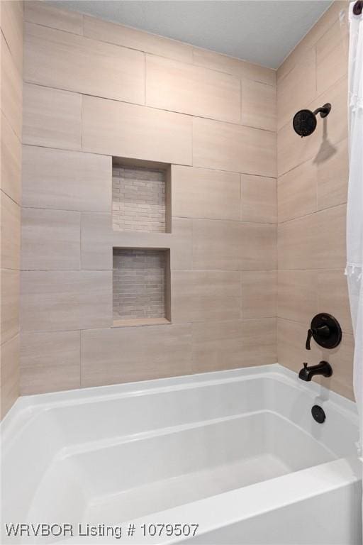 full bathroom with shower / tub combo