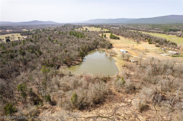 aerial view featuring a water and mountain view