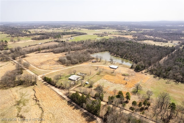 birds eye view of property with a rural view