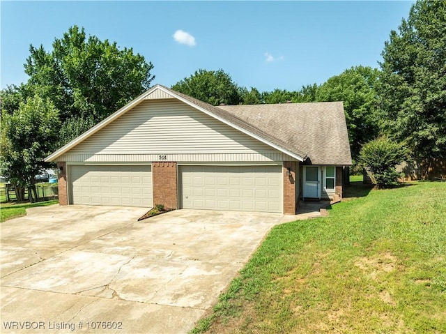 exterior space with a front yard and a garage