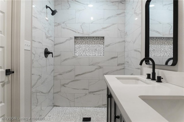 406 N 23rd St, Van Buren, AR 72956 - bathroom featuring double vanity and tiled shower