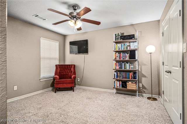 1075 Maple Ridge Dr, Greenwood, AR 72936 - living area featuring carpet floors, a ceiling fan, baseboards, and visible vents