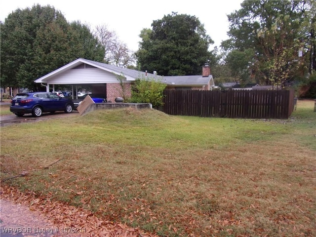 exterior space with a carport