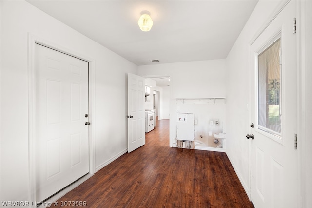 laundry room featuring dark hardwood / wood-style floors and hookup for an electric dryer