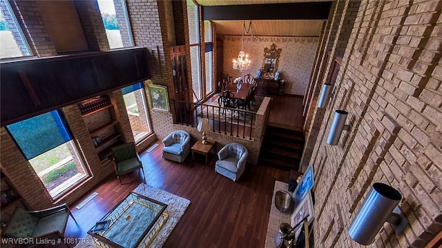 935 County Road 3456, Clarksville, AR 72830 - living room with wood finished floors and a chandelier