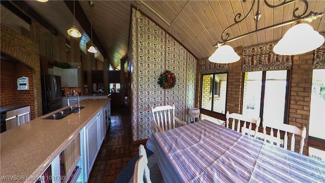 935 County Road 3456, Clarksville, AR 72830 - dining space featuring vaulted ceiling and wooden ceiling
