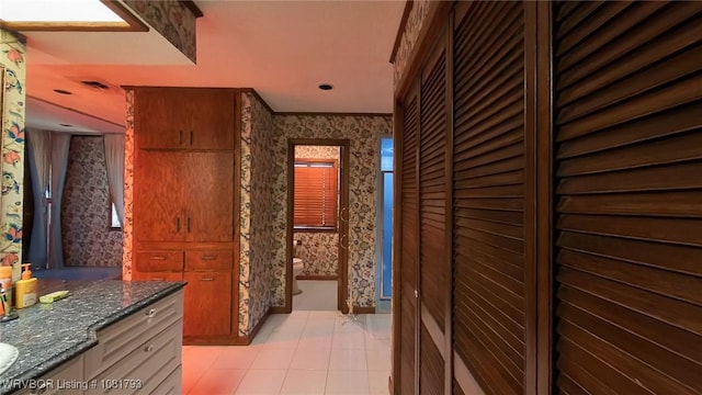 935 County Road 3456, Clarksville, AR 72830 - hall featuring wallpapered walls and light tile patterned flooring