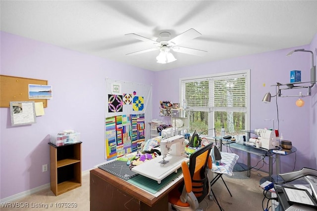 carpeted office with ceiling fan