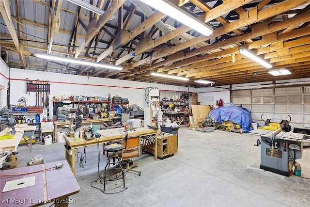 garage with a workshop area