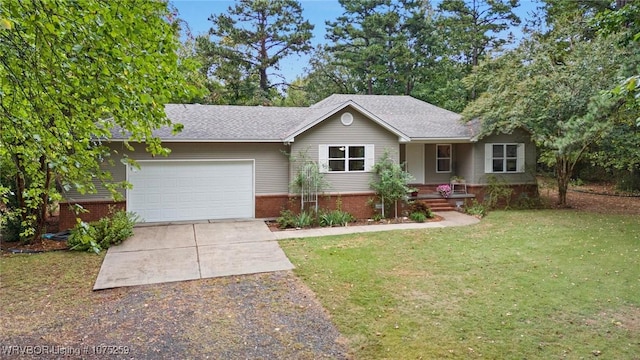 single story home with a garage and a front lawn