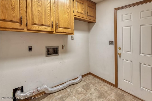 clothes washing area with electric dryer hookup, cabinets, and hookup for a washing machine