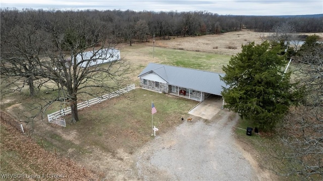 birds eye view of property with a rural view