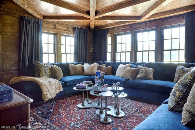 living room featuring beamed ceiling, wooden ceiling, wooden walls, and coffered ceiling