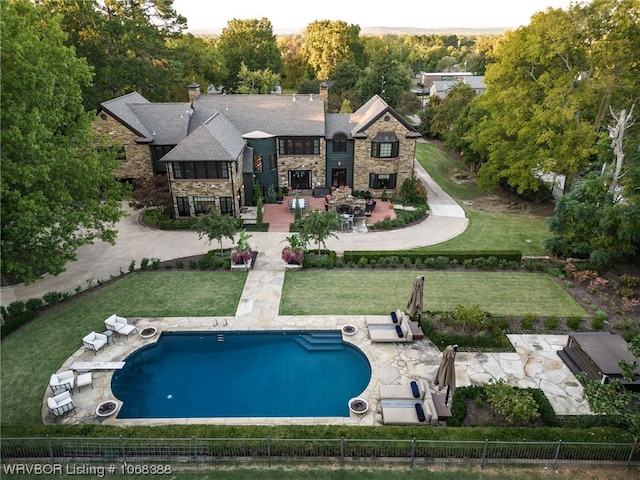 back of property featuring a patio