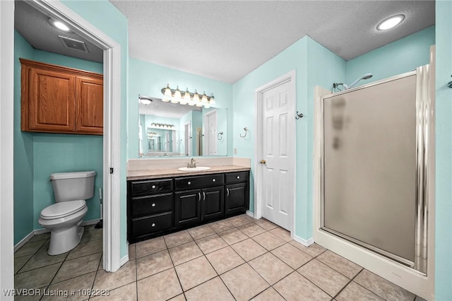 1121 Bourland St, Arkoma, OK 74901 - full bathroom featuring a shower stall, vanity, a textured ceiling, and tile patterned flooring