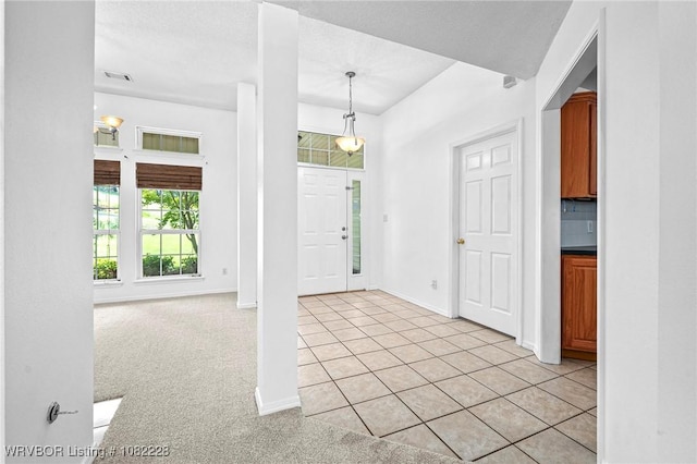 1121 Bourland St, Arkoma, OK 74901 - entrance foyer featuring baseboards and light tile patterned flooring
