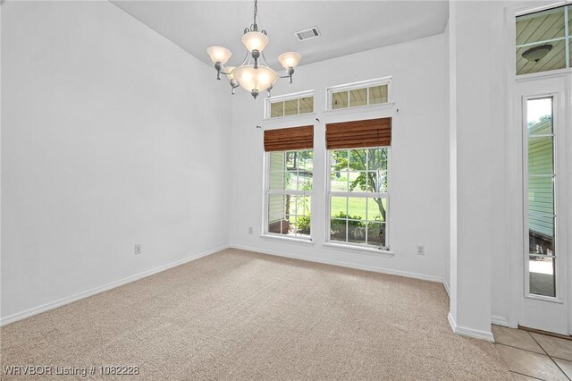 1121 Bourland St, Arkoma, OK 74901 - spare room with a chandelier and light carpet
