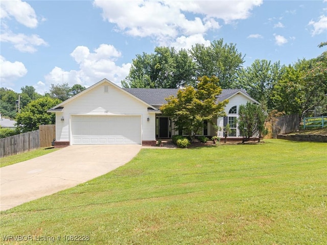 1121 Bourland St, Arkoma, OK 74901 - view of front facade featuring driveway and an attached garage