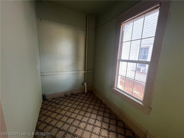 unfurnished room with plenty of natural light