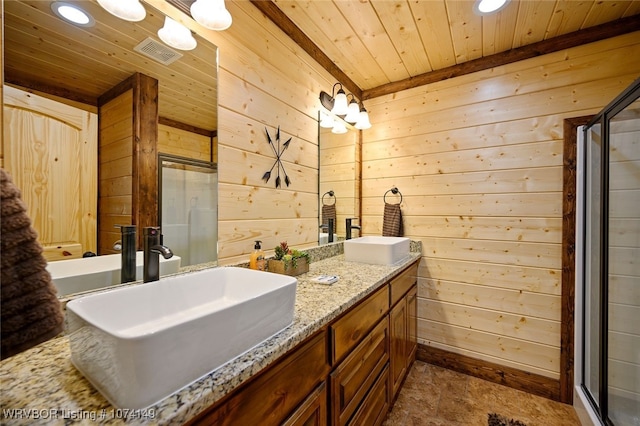 bathroom featuring wood walls, vanity, wooden ceiling, and a shower with shower door