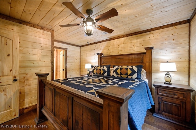 bedroom with dark hardwood / wood-style floors, wood walls, wood ceiling, and ceiling fan