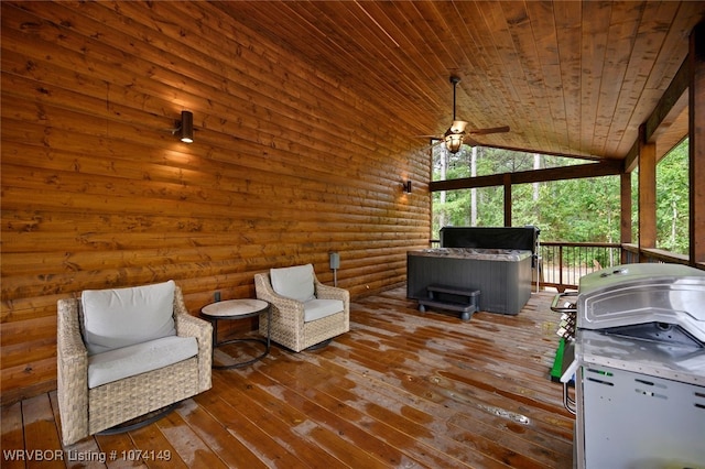 deck with ceiling fan and a grill