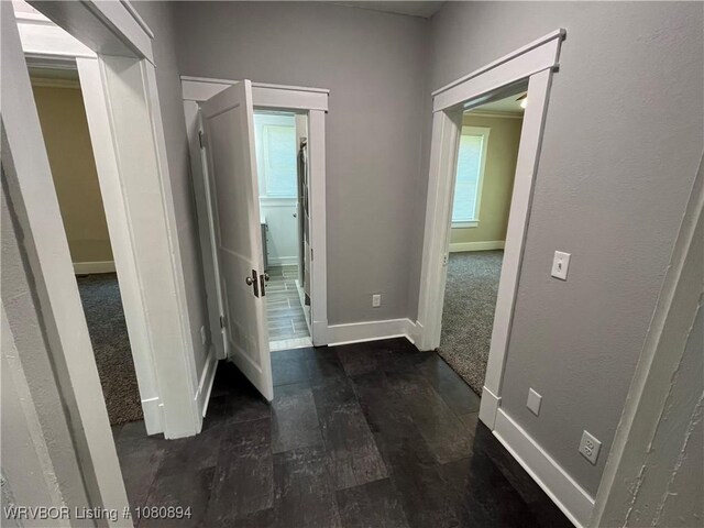 808 S 23rd St, Fort Smith, AR 72901 - hall featuring baseboards and wood finished floors