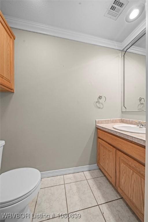 2808 May Branch Pt, Fort Smith, AR 72903 - half bath with vanity, ornamental molding, toilet, and visible vents