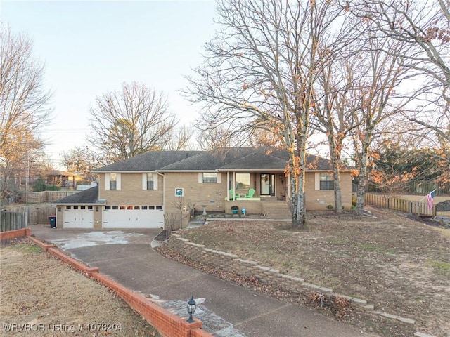 view of front of property with a garage