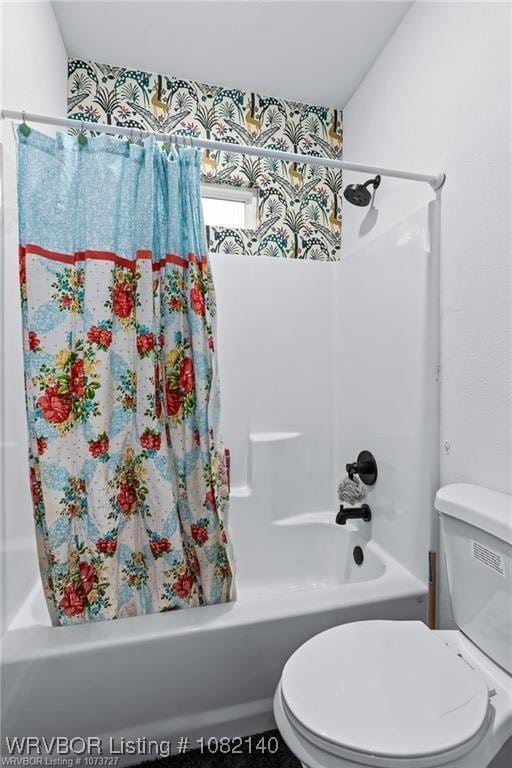 2205 Moody Rd, Barling, AR 72923 - full bathroom featuring shower / bath combo with shower curtain and toilet