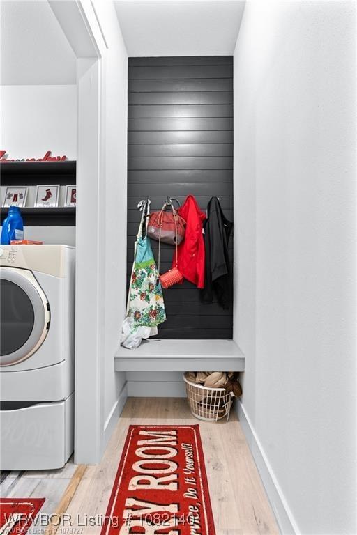 2205 Moody Rd, Barling, AR 72923 - washroom featuring wood finished floors and washer / clothes dryer