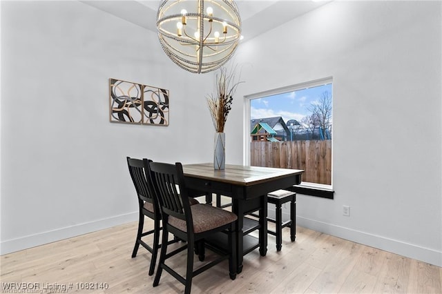 2205 Moody Rd, Barling, AR 72923 - dining area featuring a chandelier and light wood-style floors