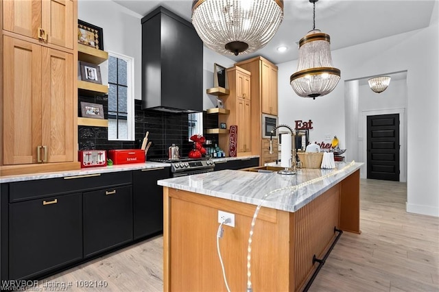 2205 Moody Rd, Barling, AR 72923 - kitchen with open shelves, dark cabinetry, light wood-style flooring, decorative backsplash, and recessed lighting