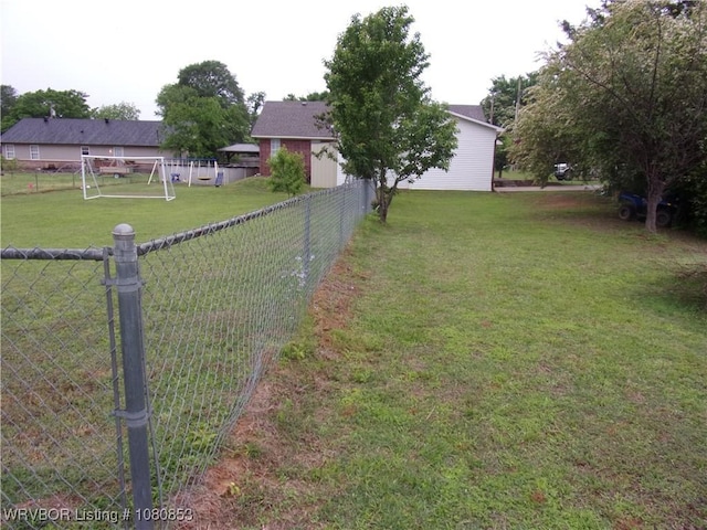 view of yard with fence
