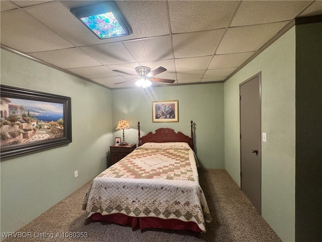 6538 110th Rd, Red Oak, OK 74563 - carpeted bedroom featuring a paneled ceiling and a ceiling fan